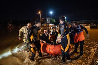 ISTANBUL, TURKIYE - SEPTEMBER 05: Search and rescue team conduct an operation to rescue flood-stuck people by a boat on the flooded road after heavy rains cause flash floods at Kucukcekmece district of Istanbul, Turkiye on September 05, 2023. (Photo by Cem Tekkesinoglu/Anadolu Agency via Getty Images)