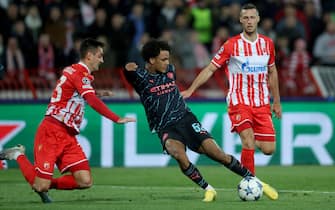 (231214) -- BELGRADE, Dec. 14, 2023 (Xinhua) -- Manchester City's Oscar Bobb (C) vies with Red Star's Srdjan Mijailovic (L) and Uros Spajic during the UEFA Champions League group G football match between Red Star and Manchester City in Belgrade, Serbia on Dec. 13, 2023. (Photo by Predrag Milosavljevic/Xinhua) - Predrag Milosavljevic -//CHINENOUVELLE_XxjpbeE007051_20231214_PEPFN0A001/Credit:CHINE NOUVELLE/SIPA/2312140852