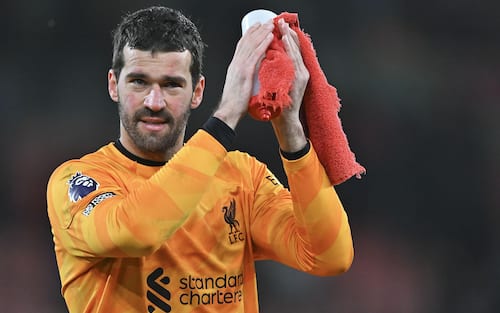 epa11094905 Alisson Becker of Liverpool applauds the fans during the English Premier League soccer match between AFC Bournemouth and Liverpool FC, in Bournemouth, Britain, 21 January 2024.  EPA/VINCE MIGNOTT EDITORIAL USE ONLY. No use with unauthorized audio, video, data, fixture lists, club/league logos, 'live' services or NFTs. Online in-match use limited to 120 images, no video emulation. No use in betting, games or single club/league/player publications.