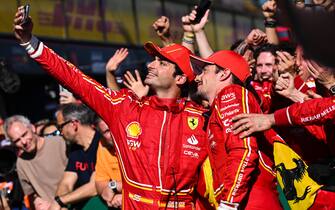 MELBOURNE GRAND PRIX CIRCUIT, AUSTRALIA - MARCH 24: Carlos Sainz, Scuderia Ferrari, 1st position, and Charles Leclerc, Scuderia Ferrari, 2nd position, celebrate by taking a selfie in Parc Ferme during the Australian GP at Melbourne Grand Prix Circuit on Sunday March 24, 2024 in Melbourne, Australia. (Photo by Sam Bagnall / LAT Images)