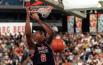 14 AUG 1994:  DERRICK COLEMAN OF THE USA DREAM TEAM II SLAM DUNKS AGAINST RUSSIA DURING THE FIRST HALF OF THEIR CHAMPIONSHIP FINAL GAME IN THE WORLD CHAMPIONSHIPS OF BASKETBALL AT THE SKYDOME STADIUM IN TORONTO, ONTARIO, CANADA. Mandatory Credit: Doug Pe