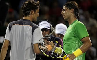 KEY BISCAYNE, FL - APRIL 01:  Rafael Nadal (R) of Spain is congratulated by Roger Federer of Switzerland after Nadal won their men's semifinal singles match at the Sony Ericsson Open at Crandon Park Tennis Center on April 1, 2011 in Key Biscayne, Florida.  (Photo by Clive Brunskill/Getty Images)