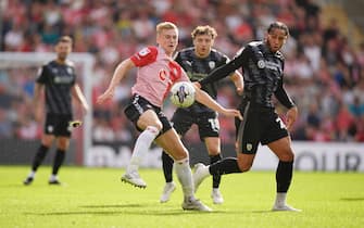 Southampton's Flynn Downes and Rotherham United's Sam Nombe battle for the ball during the Sky Bet Championship match at St Mary's Stadium, Southampton. Picture date: Saturday October 7, 2023.