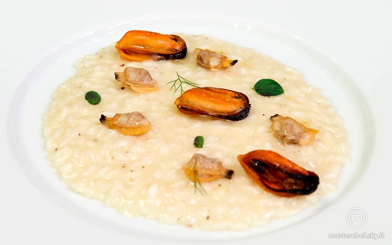 Risotto mantecato al Bagoss, cozze e vongole