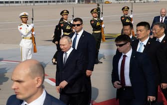epa10922901 Russian President Vladimir Putin (2-L) arrives in Beijing, China, 17 October 2023. Vladimir Putin will attend the third Belt and Road Forum.  EPA/XINHUA / JIN LIWANG CHINA OUT / UK AND IRELAND OUT  /       MANDATORY CREDIT  EDITORIAL USE ONLY  EDITORIAL USE ONLY