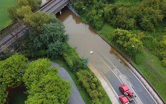 Operazioni di soccorso per rendere agibile il sottopasso delle Celle (Rimini) completamente allagato in seguito all'ondata di maltempo che ha colpito il centro Italia. Rimini, 19 settembre 2024 ANSA/DORIN MIHAI/PASQUALE BOVE