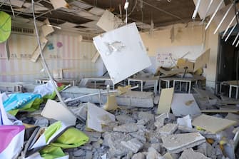 epa11637150 A school damaged by ballistic missiles fired from Iran, in Gedera, Israel, 02 October 2024. According to the Israeli military, Iran launched over 180 ballistic missiles towards Israel in the evening of 01 October, with alert sirens sounding across the country.  EPA/ABIR SULTAN