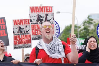 epa11494472 Protesters against the Israeli operations in Gaza and US weapons sales to Israel gather on the day of the visit of Prime Minister of Israel Benjamin Netanyahu on Capitol Hill in Washington, DC, USA, 24 July 2024. Netanyahu's address to a joint meeting of the US Congress comes amid a close 2024 US presidential election cycle. Thousands of pro-Palestinian protesters were expected to gather near the US Capitol when Netanyahu becomes the first leader to address the US Congress four times.  EPA/AARON SCHWARTZ