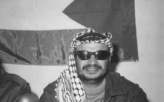 23rd February 1970:  Yasser Arafat (R), leader of the Palestinian nationalist movement Al Fatah, sits next to guerilla spokesman and poet Kamal Nasser (1925 - 1973) during a press conference in Amman, Jordan.  (Photo by Hulton Archive/Getty Images)