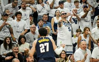 MINNEAPOLIS , MN - MAY 12: Minnesota Timberwolves fans heckle Jamal Murray (27) of the Denver Nuggets after he was charged with a foul during the fourth quarter of the Nuggets' 115-107 win over the T-Wolves at Target Center in Minneapolis, Minnesota on Sunday, May 12, 2024. (Photo by AAron Ontiveroz/The Denver Post)