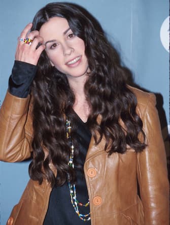 260866 20: Singer Alanis Morissette stands at the 38th Annual Grammy Awards February 28, 1996 in Los Angeles, CA. Morissette won four awards including Best Rock Album for "Jagged Little Pill" and Best Female Rock Vocal Performance for "You Oughta Know." (Photo by Russell Einhorn/Liaison)