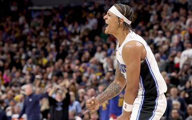 DENVER, COLORADO - JANUARY 05: Paolo Banchero #5 of the Orlando Magic celebrates their win against the Denver Nuggets at Ball Arena on January 05, 2024 in Denver, Colorado.  NOTE TO USER: User expressly acknowledges and agrees that, by downloading and or using this photograph, User is consenting to the terms and conditions of the Getty Images License Agreement.  (Photo by Matthew Stockman/Getty Images)