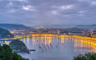 The famous La Concha beach in San Sebastian at dawn