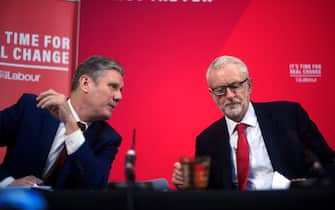 LONDON, ENGLAND - DECEMBER 06: Labour politician Keir Starmer and Labour leader Jeremy Corbyn talk onstage during a campaign speech on December 6, 2019 in London, England. Mr Corbyn announced that he has a government report which shows that there will be customs checks between Britain and Northern Ireland. (Photo by Peter Summers/Getty Images)