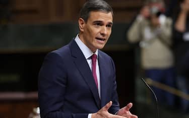 MADRID , SPAIN - NOVEMBER 15: Spanish acting Prime Minister Pedro Sanchez speaks during the investiture debate at the Spanish Parliament on November 15, 2023 in Madrid, Spain. The investiture debate at Spain's parliament on November 15 will be followed by a vote for PM Sanchez to remain in power and is expected to bring an end to months of political deadlock following July's inconclusive snap general election. Pedro Sanchez's support from Catalan separatists was obtained in exchange for a highly controversial amnesty law. (Photo by Isabel Infantes/Getty Images)