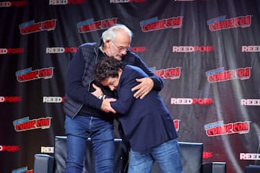 NEW YORK, NEW YORK - OCTOBER 08: Actors Christopher Lloyd (L) and Michael J. Fox attend a "Back To The Future Reunion" at New York Comic Con on October 08, 2022 in New York City. (Photo by Mike Coppola/Getty Images)