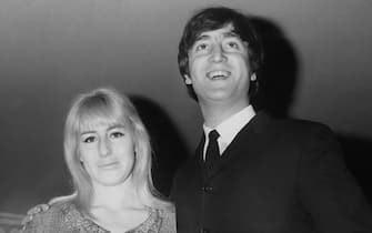 Musician, singer and songwriter John Lennon (1940 - 1980) of British rock group the Beatles with his first wife Cynthia during the launch of his book 'In His Own Write' at the Dorchester Hotel in London, 23rd April 1964. (Photo by Douglas Miller/Keystone/Hulton Archive/Getty Images)