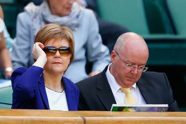 LONDON, ENGLAND - JULY 11:  Nicola Sturgeon and her husband Peter Murrell (R) attend day twelve of the Wimbledon Lawn Tennis Championships at the All England Lawn Tennis and Croquet Club on July 11, 2015 in London, England.  (Photo by Julian Finney/Getty Images)