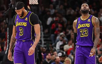 CHICAGO, ILLINOIS - DECEMBER 20: Anthony Davis #3 and LeBron James #23 of the Los Angeles Lakers look on against the Chicago Bulls during the second half at the United Center on December 20, 2023 in Chicago, Illinois. NOTE TO USER: User expressly acknowledges and agrees that, by downloading and or using this photograph, User is consenting to the terms and conditions of the Getty Images License Agreement.  (Photo by Michael Reaves/Getty Images)