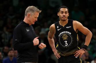 BOSTON, MASSACHUSETTS - JANUARY 19: Golden State Warriors head coach Steve Kerr talks with Jordan Poole #3 of the Golden State Warriors during the second half at TD Garden on January 19, 2023 in Boston, Massachusetts. The Celtics defeat the Warriors 121-118. NOTE TO USER: User expressly acknowledges and agrees that, by downloading and or using this photograph, User is consenting to the terms and conditions of the Getty Images License Agreement. (Photo by Maddie Meyer/Getty Images)