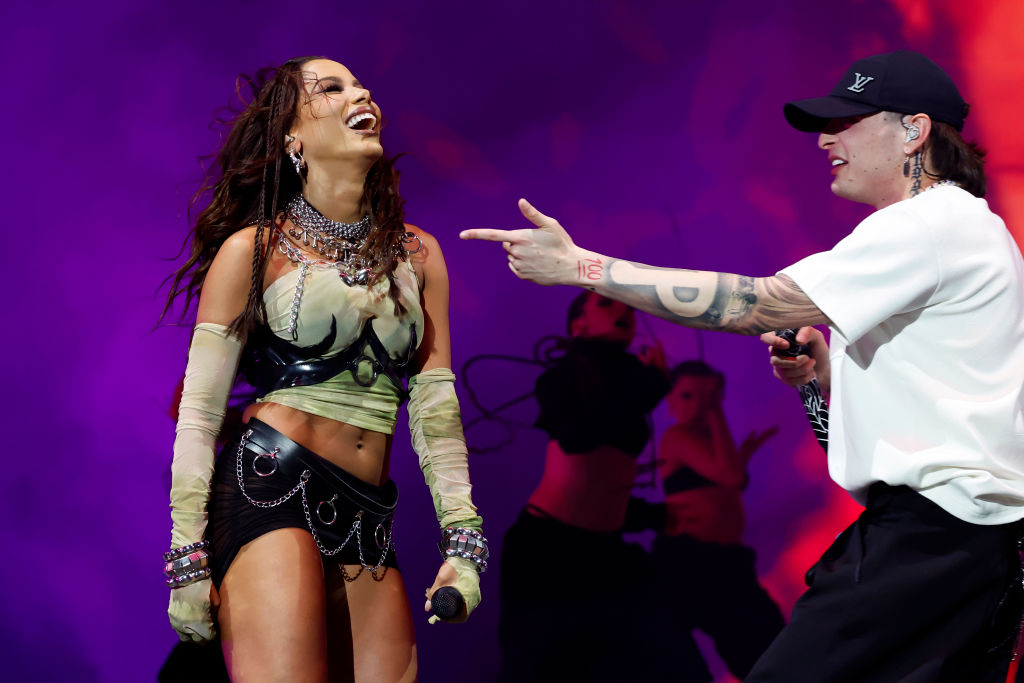 INDIO, CALIFORNIA - APRIL 19: (FOR EDITORIAL USE ONLY) (L-R) Anitta performs with Peso Pluma at the Coachella Stage during the 2024 Coachella Valley Music and Arts Festival at Empire Polo Club on April 19, 2024 in Indio, California. (Photo by Frazer Harrison/Getty Images for Coachella)