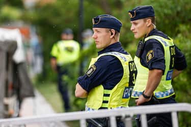 Police make preparations for a demonstration outside Iraq's embassy in Stockholm, Sweden on July 20, 2023. Iraq warned Sweden on July 20, 2023 that it would cut diplomatic relations if a Koran-burning protest is allowed to go ahead in Stockholm, after protesters stormed and torched the Swedish embassy in Baghdad overnight. (Photo by Caisa RASMUSSEN / various sources / AFP) / Sweden OUT (Photo by CAISA RASMUSSEN/TT NEWS AGENCY/AFP via Getty Images)