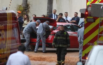 (240809) -- CAPELA DE VINHEDO (BRAZIL), Aug. 9, 2024 Photo by Xinhua/ABACAPRESS.COM) -- Firemen work near a plane crash site in the neighborhood of Capela de Vinhedo, State of Sao Paulo, Brazil, on Aug. 9, 2024. A plane with 62 people on board, 58 passengers and four crew members, crashed Friday in the Brazilian state of Sao Paulo, reported the news network GloboNews, citing airport and airline sources. Photo by Xinhua/ABACAPRESS.COM/Rahel Patrasso)