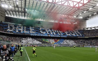 Inter’s supporters display a banner during the Italian serie A soccer match between Fc Inter  and Torino at  Giuseppe Meazza stadium in Milan, 28 April 2024.
ANSA / MATTEO BAZZI