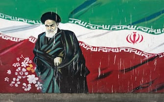 Ayatollah Khomeini and Iran flag mural, Tehran, Iran