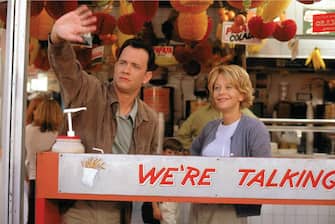 This image released by Warner Bros. Home Video shows actors Tom Hanks, left, and Meg Ryan in a scene from the romantic comedy "You've Got Mail," directed, co-written and co-produced by Nora Ephron. Publisher Alfred A. Knopf confirmed Tuesday, June 26, 2012, that author and filmmaker Nora Ephron died Tuesday of leukemia in New York. She was 71. (AP Photo/Warner Bros. Home Video)