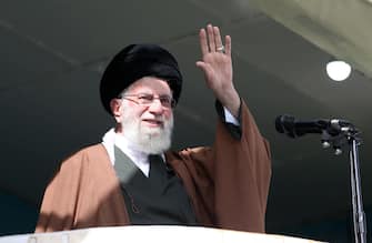 epa10585426 A handout photo made available by the Iranian supreme leader office shows Ayatollah Ali Khamenei greeting the crowd after the Eid al-Fitr prayer ceremony in Tehran, Iran, 22 April 2023.  EPA/SUPREME LEADER OFFICE HANDOUT  HANDOUT EDITORIAL USE ONLY/NO SALES
