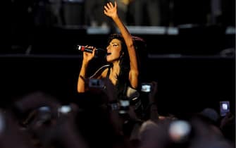 British singer Amy Winehouse performs live at the concert celebrating the 90th birthday of former South-African president and political activist Nelson Mandela held in Central London's Hyde Park, 27 June 2008.ANSA/DANIEL DEME