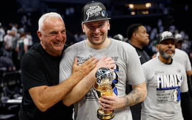 MINNEAPOLIS, MINNESOTA - MAY 30: Luka Doncic #77 of the Dallas Mavericks celebrates with is father Sasa after a 124-103 victory against the Minnesota Timberwolves in Game Five of the Western Conference Finals at Target Center on May 30, 2024 in Minneapolis, Minnesota. NOTE TO USER: User expressly acknowledges and agrees that, by downloading and or using this photograph, User is consenting to the terms and conditions of the Getty Images License Agreement. (Photo by David Berding/Getty Images)