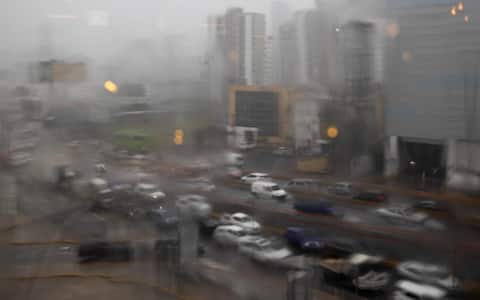 epa12486526 Vehicles travel along John F. Kennedy Avenue in the rain caused by Hurricane Melissa in Santo Domingo, Dominican Republic, 27 October 2025. Authorities have warned that Hurricane Melissa will continue to bring significant rainfall to the Dominican Republic in the coming days. As a result of the heavy rain impacting numerous aqueducts, over one million people are currently without access to drinking water, and more than 3,700 individuals have been displaced from their homes.  EPA/ORLANDO BARRIA