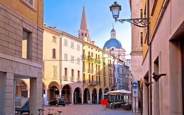 Mantova idyllic italian city street and church towers view
