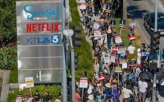 LOS ANGELES, CA - JULY 14: SAG-AFTRA members take to the picket line outside Netflix on Sunset Boulevard and Van Ness Avenue in Los Angeles, CA on Friday, July 14, 2023. Actors join striking writers who have been on the picket lines since the beginning of May. (Myung J. Chun / Los Angeles Times via Getty Images)