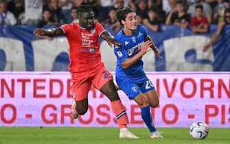 Udinese's defender Festy Ebosele(L)  against Empoli's forward Matteo Cancellieri during the Italian serie A soccer match Empoli FC vs Udinese calcio at Carlo Castellani Stadium in Empoli, Italy, 6 October 2023
ANSA/CLAUDIO GIOVANNINI