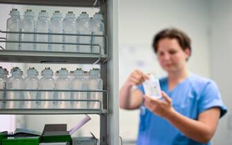 Nursing assistant 29-year Daria from Ukraine controls medicines at the St. Johannes hospital in Dortmund, western Germany, on May 10, 2023. Within the framework of the promotion of the recruitment of skilled workers from non-European countries, against the background of the acute shortage of skilled workers in the health and care sector, approximately 80 people, including 20 nurses from Ukraine, have been trained as nursing staff at the Johannes hospital to date. In order to be able to start a new working life in an unfamiliar country, the linguistic, professional and cultural integration of international nurses into the world of the German hospital system is of extraordinary importance. (Photo by Ina FASSBENDER / AFP) (Photo by INA FASSBENDER/AFP via Getty Images)