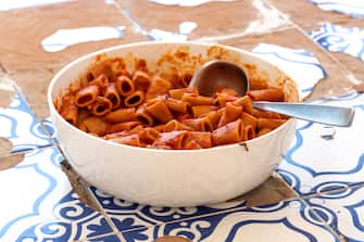 Rigatoni Amatriciana sauce, traditional Italian pasta sauce based on guanciale (cured pork cheek), pecorino cheese from Amatrice, tomato (San Marzano tomatoes, specifically), white wine, black pepper
