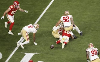 epa11146415 Kansas City Chiefs Isiah Pacheco (3-R, on ground) fumbles the ball as the 49ers' Javon Hargrave (R), Chase Young (2-R) Kalia Davis (4-R) and Deommodore Lenoir (2-L) defend, and then recover the ball, during the first half of Super Bowl LVIII between the Kansas City Chiefs and the San Fransisco 49ers at Allegiant Stadium in Las Vegas, Nevada, USA, 11 February 2024. The Super Bowl is the annual championship game of the NFL between the AFC Champion and the NFC Champion and has been held every year since 1967.  EPA/CAROLINE BREHMAN
