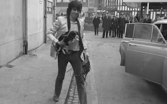 Keith richards arrives at Coventry Theatre carrying a young King Charles Spaniel under his arm. He will be on stage along with other members of ther Rolling Stones band tonight.
6th March 1971