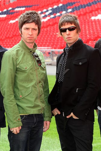 LONDON - OCTOBER 16: L-R Noel Gallagher and Liam Galllagher attend the Oasis photocall in Wembley Stadium to promote their new album 'Dig out Your Soul' released on October 6, and their two sold out concerts at Wembley Arena, on October 16, 2008 in London, England. (Photo by Dave Hogan/Getty Images)
