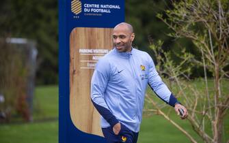 epa11227820 French Olympic and U21 team coach Thierry Henry arrives at the national team's training complex ahead a training session in Clairefontaine-en-Yvelines, south of Paris, France, 18 March 2024. France will face Germany for a friendly match on 23 March 2024.  EPA/CHRISTOPHE PETIT TESSON