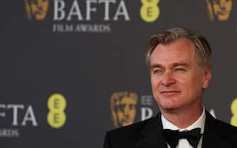 British film producer and director Christopher Nolan poses on the red carpet upon arrival at the BAFTA British Academy Film Awards at the Royal Festival Hall, Southbank Centre, in London, on February 18, 2024. (Photo by Adrian DENNIS / AFP)