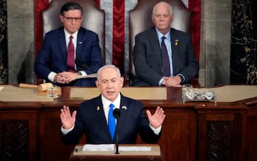 WASHINGTON, DC - JULY 24: Israeli Prime Minister Benjamin Netanyahu addresses a joint meeting of Congress in the House of Representatives with Sen. Ben Cardin (D-MD) and Speaker of the House Mike Johnson (R-LA) at the U.S. Capitol on July 24, 2024 in Washington, DC. Netanyahu’s visit occurs as the Israel Hamas war reaches nearly ten months. A handful of Senate and House Democrats have pledged to boycott the remarks over Israel’s treatment of Palestinian. (Photo by Kent Nishimura/Getty Images)