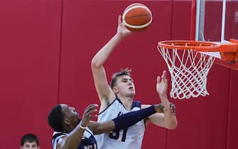 LAS VEGAS, NEVADA - JULY 08: Cooper Flagg #31 of the 2024 USA Basketball Men's Select Team scores a basket after being fouled by Bam Adebayo #13 of the 2024 USA Basketball Men's National Team during a practice session scrimmage at the team's training camp at the Mendenhall Center at UNLV on July 08, 2024 in Las Vegas, Nevada. (Photo by Ethan Miller/Getty Images)