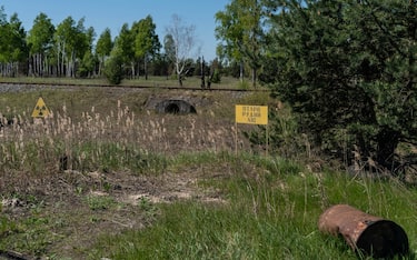 Sign shows dangerous level of radiation hot spot in abandoned city of Pripyat in Ukraine on May 6, 2023 from where all dwellers were evacuated after disaster on Chernobyl nuclear plant. (Photo by Lev Radin/Sipa USA)