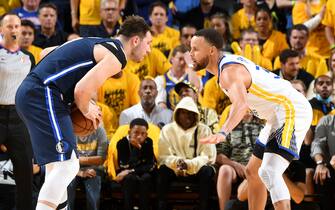 SAN FRANCISCO, CA - MAY 20: Stephen Curry #30 of the Golden State Warriors plays defense on Luka Doncic #77 of the Dallas Mavericks during Game 2 of the 2022 NBA Playoffs Western Conference Finals on May 20, 2022 at Chase Center in San Francisco, California. NOTE TO USER: User expressly acknowledges and agrees that, by downloading and or using this photograph, user is consenting to the terms and conditions of Getty Images License Agreement. Mandatory Copyright Notice: Copyright 2022 NBAE (Photo by Andrew D. Bernstein/NBAE via Getty Images)