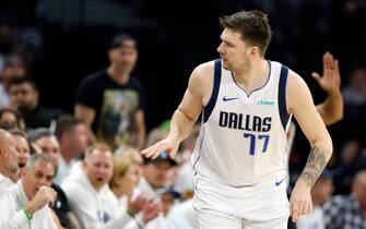 MINNEAPOLIS, MINNESOTA - MAY 30: Luka Doncic #77 of the Dallas Mavericks reacts after a basket during the first quarter against the Minnesota Timberwolves in Game Five of the Western Conference Finals at Target Center on May 30, 2024 in Minneapolis, Minnesota. NOTE TO USER: User expressly acknowledges and agrees that, by downloading and or using this photograph, User is consenting to the terms and conditions of the Getty Images License Agreement. (Photo by David Berding/Getty Images)