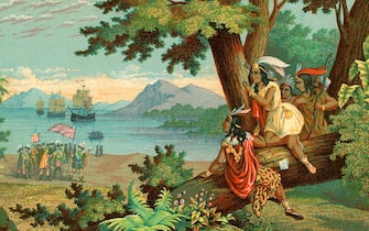 Vintage illustration of Christopher Columbus arriving in the New World; chromolithograph, 1900. (Photo by GraphicaArtis/Getty Images)